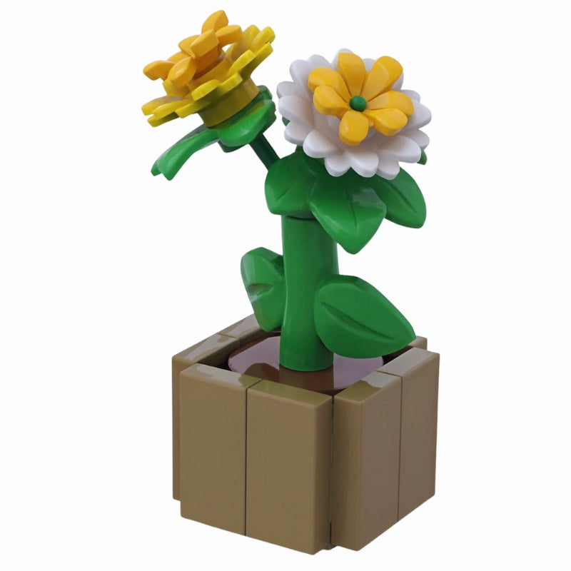 
                  
                    Three layered yellow and white dahlia flowers built from LEGO bricks in a modern square pot – a decorative botanical build from Brickis Botanix
                  
                