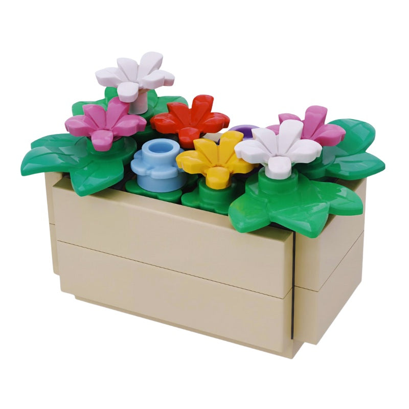 Custom LEGO flower planter box with colorful blooms and greenery – a medium-sized botanicals display from the Brickis Botanix collection