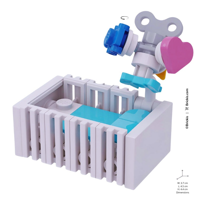 
                  
                    LEGO turquoise cot build with nursery mobile and pastel colors – perfect for baby-themed Mini build MOCs
                  
                