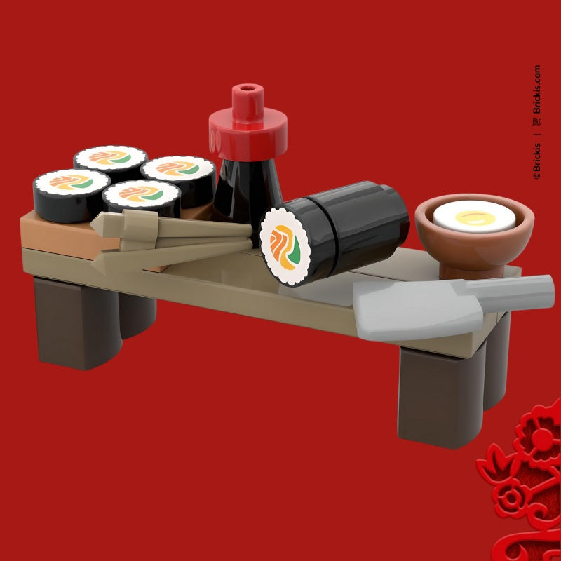 
                  
                    Artisanal LEGO sushi model with soy sauce and chopsticks, nodding to world-renowned Nikkei cuisine and top chefs like Micha Tsumura.
                  
                