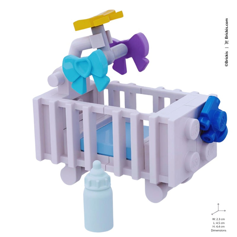 
                  
                    White LEGO baby crib with blue bedding, spinning mobile, and pastel bottle – a sweet nursery build to welcome a baby boy.
                  
                