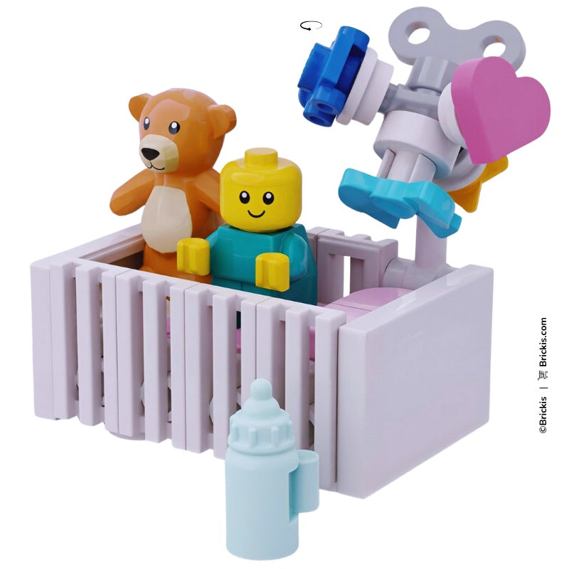 LEGO baby bed in pink with crib details, teddy bear, and bottle – MOC nursery mini build