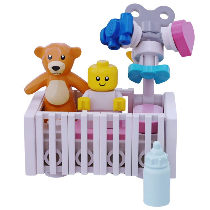 
                  
                    Pink LEGO baby crib build for newborn scenes – includes bottle, bear, and pastel mobile
                  
                