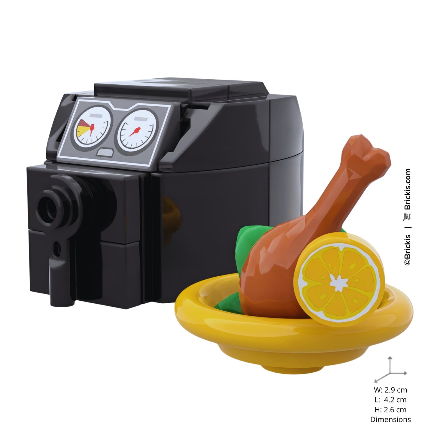 LEGO mini air fryer with food accessories including chicken, orange slice, lettuce, and plate