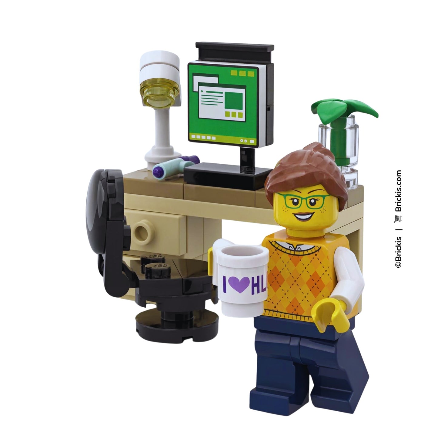 LEGO home office computer desk scene with desk lamp, monitor and coffee mug used by a minifigure.