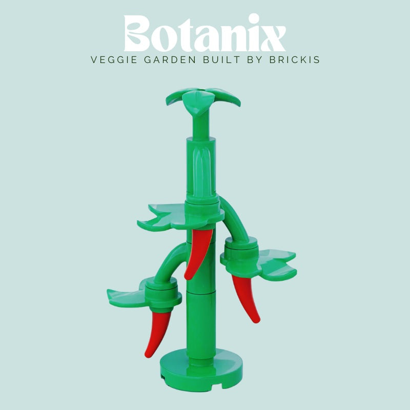 
                  
                    LEGO red chili pepper plant from the Botanix Veggie Garden series by Brickis, featuring bright green stalks and curved red pods in a minimalist display
                  
                