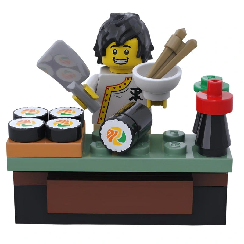 Miniature LEGO Japanese sushi bar featuring brick-built rolls, serving tray, and chopsticks — perfect for creative cultural displays.